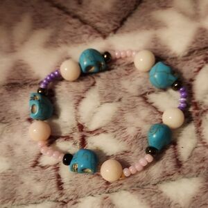 Colorful Beaded Bracelet with Skull Accents